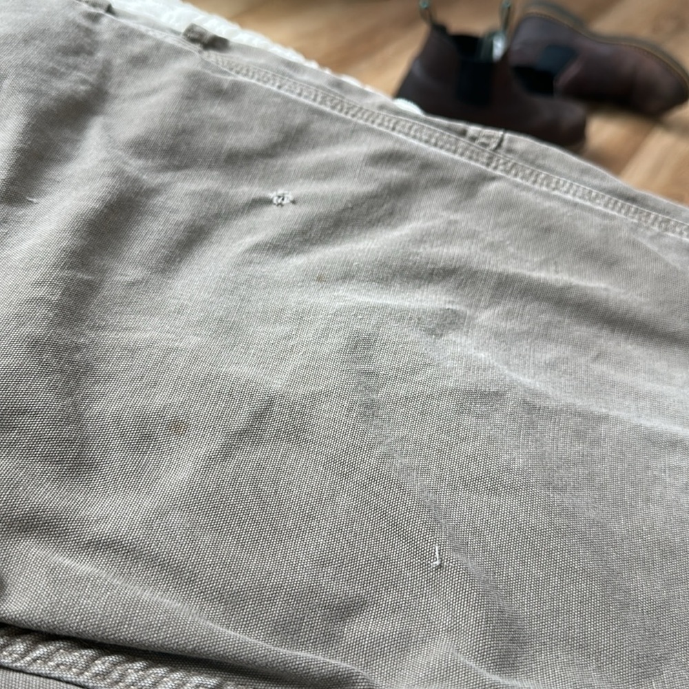 Carhartt distressed carpenter pants with some stains and holes. #10015 - Picture 8 of 11